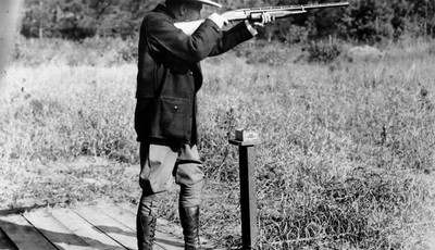 
              FILE - In this Sept. 6, 1928 file photo, U.S. President Calvin Coolidge shoots at clay pigeons at his vacation home on the Brule at Superior, Wis, He scored 29 out of 37. The White Hous